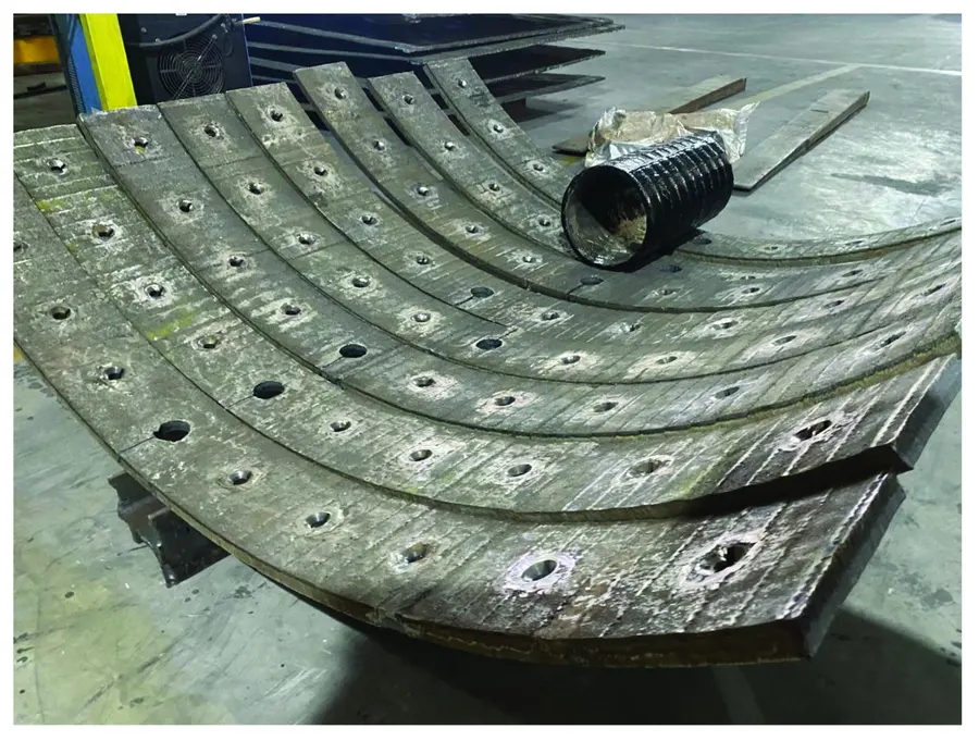 Rolling D-Plate into a curved liner
